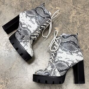 Kayleen platform heeled snakeskin boots
